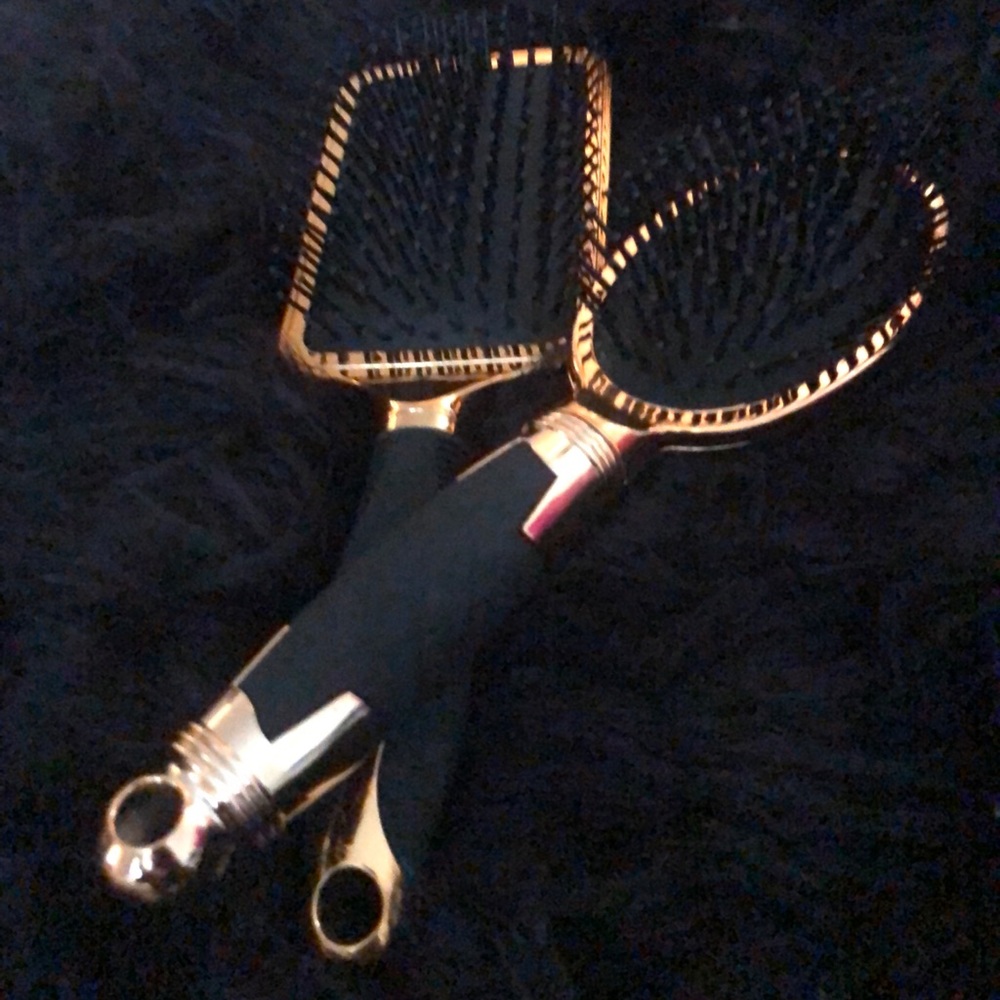 Hair brushes.